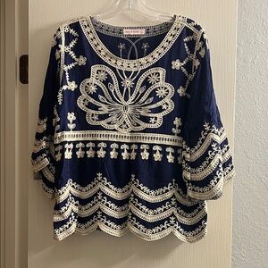 Elegant Women's Navy Blouse with White Detailing